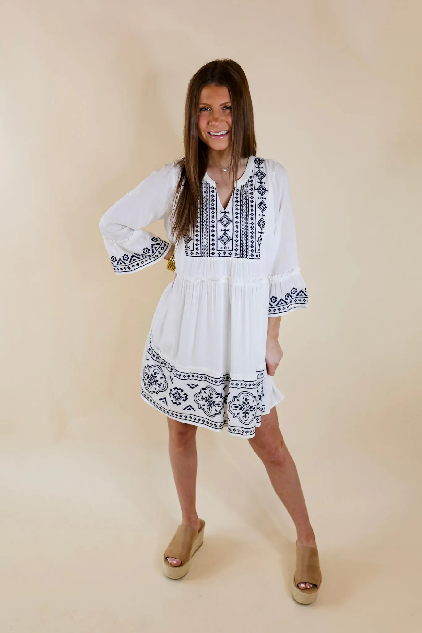 Peaceful And Pretty Navy Embroidered Dress with Notched Neckline in White